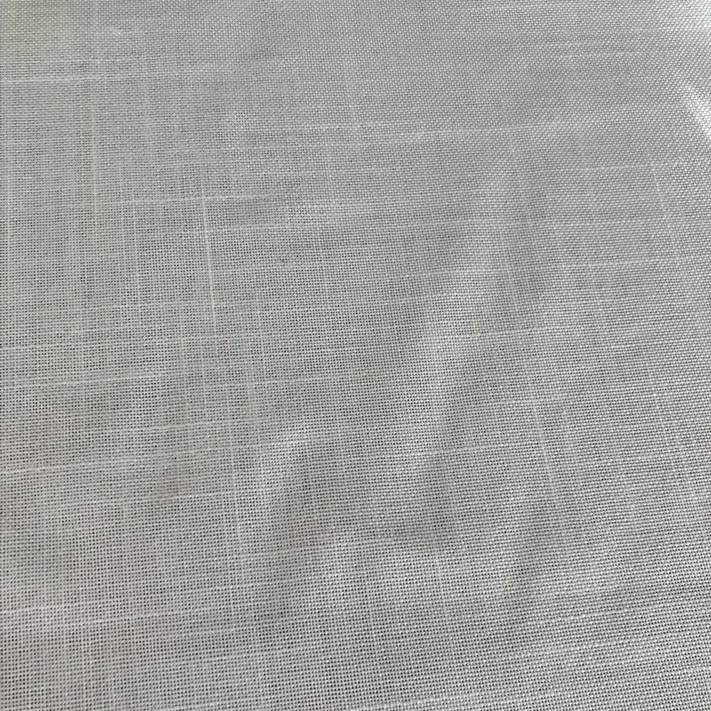Off white oval tablecloth 96” x 56”